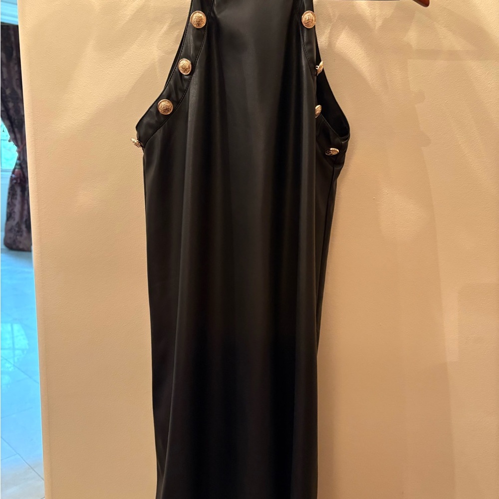 Elegant Black Dress with Gold Button Accents